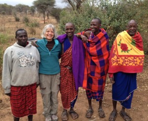 Our Maasai guides help Betsy celebrate her birthday in camp.