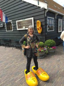 Over-sized wooden shoes won't hurt your feet when walking